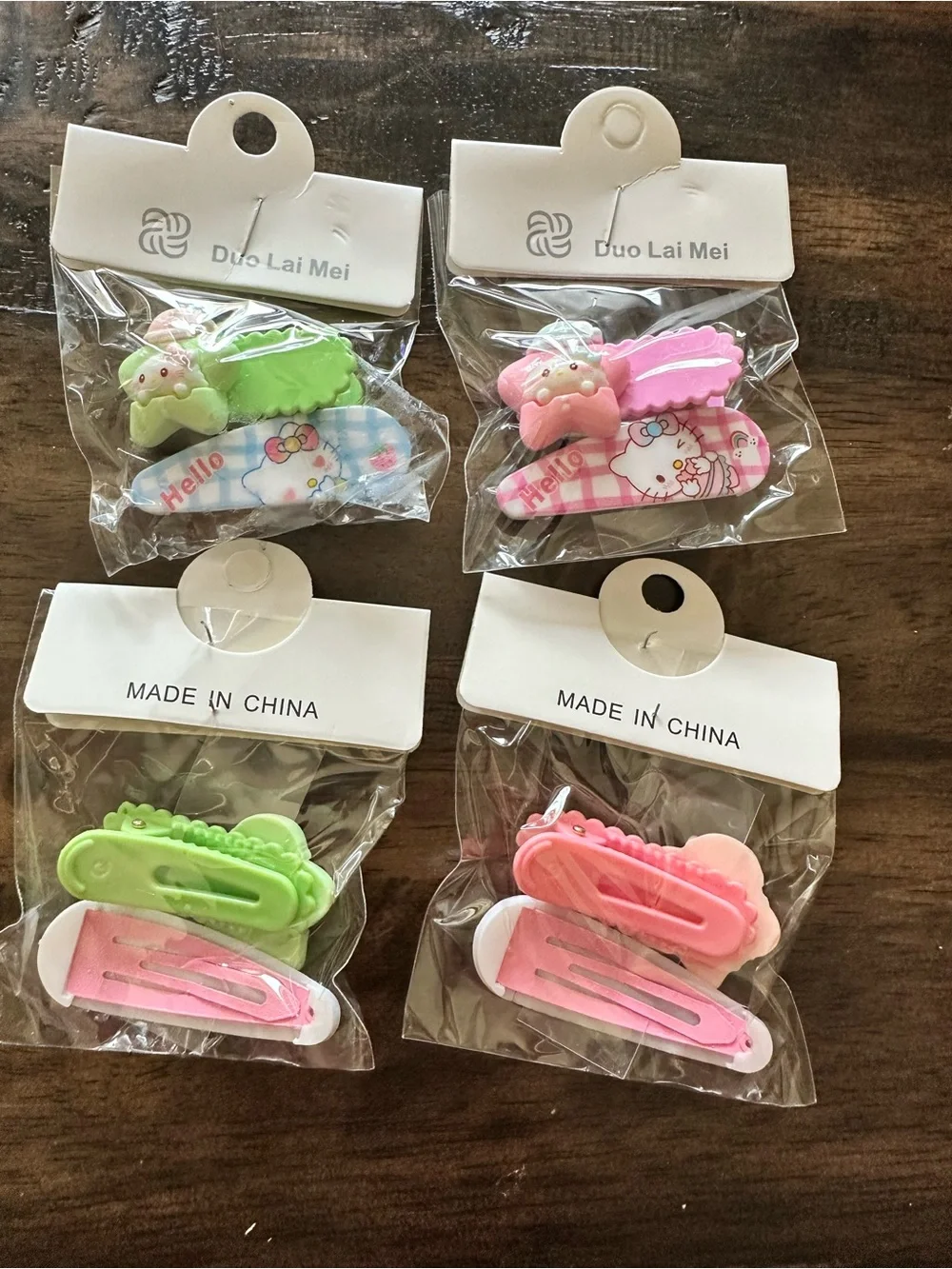 NWT Set of 4 Hello Kitty Child Size Hair Clips Barretts Pink Blue & Green
